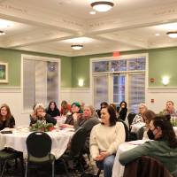 WGS Director Julia Mason addresses the event audience